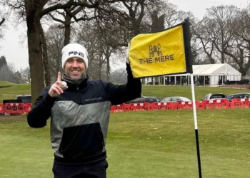 Another Ace Landmark for Jon Beesley Jon poses after his grand slam ace.