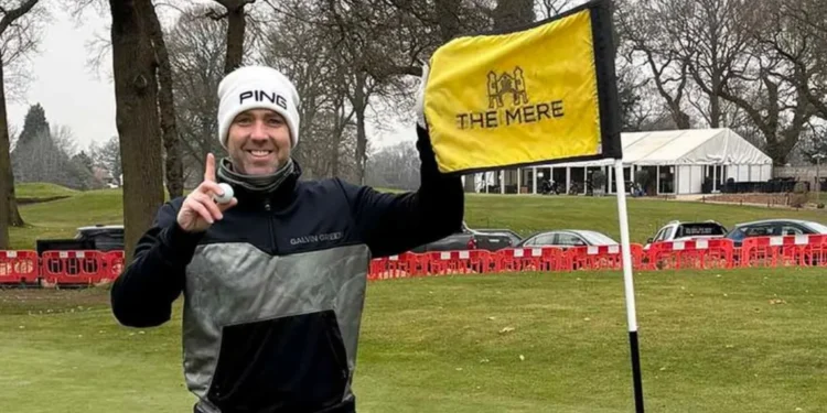 Another Ace Landmark for Jon Beesley Jon poses after his grand slam ace.
