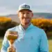 Van Wyk Wins Welsh Men’s Open at Conwy Jamie Van Wyk proudly displays the trophy after winning the Welsh Men’s Open Strokeplay Championship at Conwy.