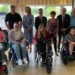 Bert Dyson Classic Raises £9,000 and Delivers Independence a group of people posing for a photo