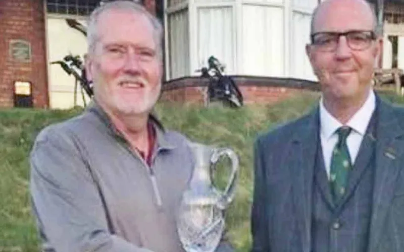 Gareth Bradley Wins Seniors Frank Stableford Trophy Gareth Bradley receives the trophy from Wallasey captain Dave Pennington.