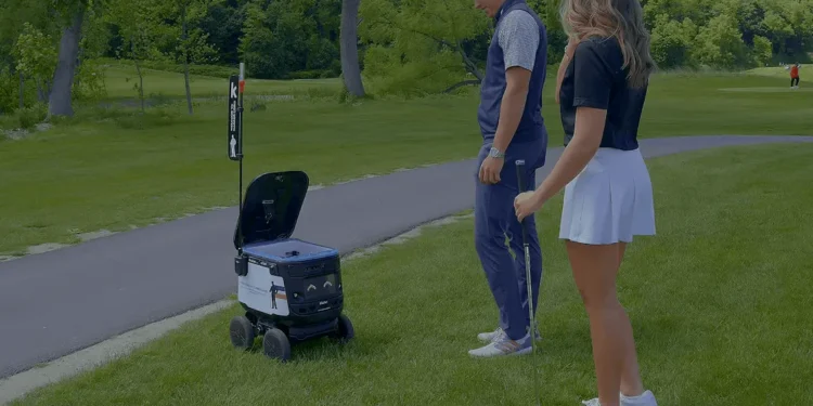 Harbor Links First U.S. Course to Use Food Delivery Robots a man and woman standing on a golf course