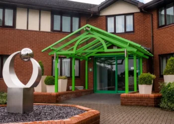 The Gateway to Wales Mixed Golf Festival 2025 Shines a building with a green roof