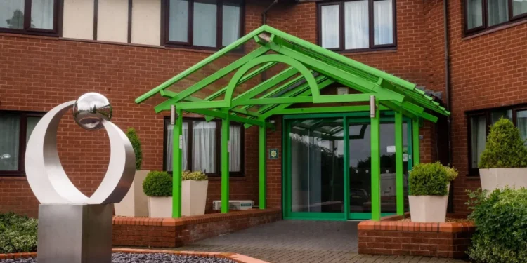 The Gateway to Wales Mixed Golf Festival 2025 Shines a building with a green roof