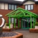 The Gateway to Wales Mixed Golf Festival 2025 Shines a building with a green roof