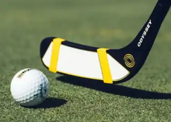 a golf club and a golf ball