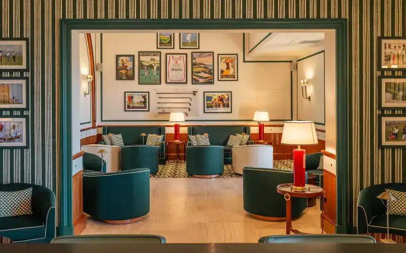 Discover Verdura Resort’s elegant new clubhouse in Sicily Verdura Resort’s new clubhouse interior featuring elegant seating, golf memorabilia, and vintage posters.