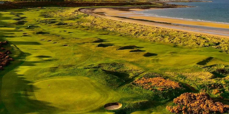 Royal Dornoch Launches Coastal Monitoring Plan a golf course with sand bunkers and a beach
