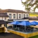 Gateway to Wales Spring Golf Festival 2025 a building with a patio and umbrellas