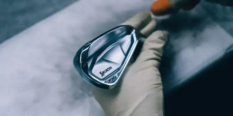 Discover Srixon's i-FORGED: Revolutionising Golf Irons A person holding a Srixon’s i-FORGED club.