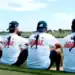 Fireballs GC Launches New Fan-Wear for Andalucía Event a group of men sitting on grass