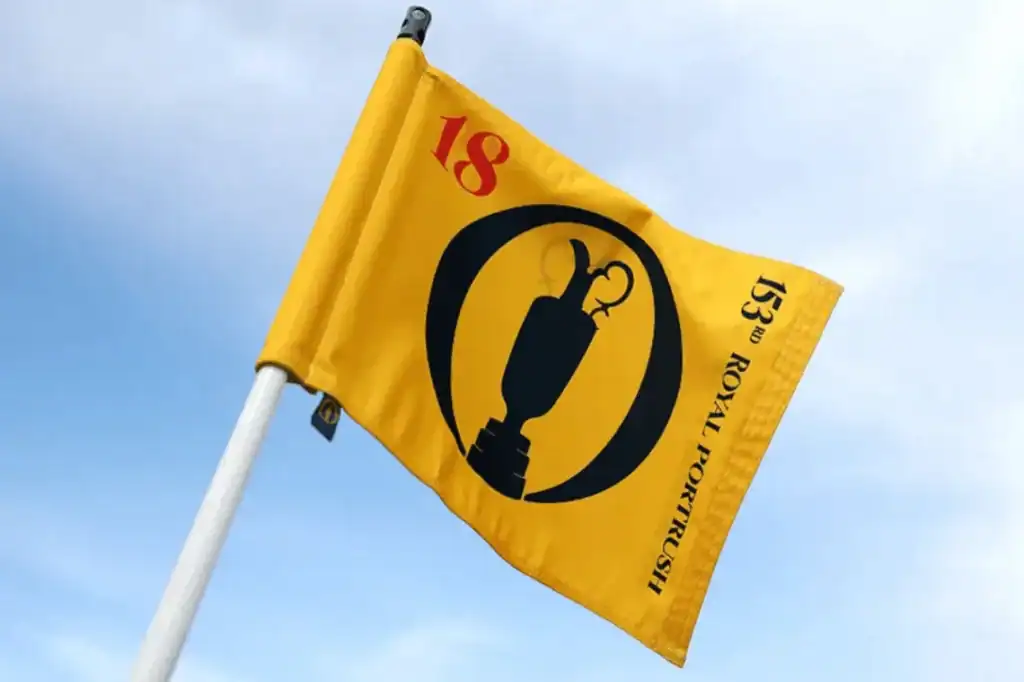 The Open to Stay Free-to-Air on BBC Through 2027 a yellow flag with a black and red design on it