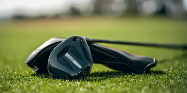Titleist Launches GT1 3TOUR Fairway with Lower Spin Titleist GT1 3TOUR fairway wood resting on fairway grass with headcover in background.