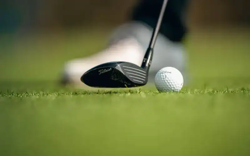 Titleist Launches GT1 3TOUR Fairway with Lower Spin Titleist GT1 3TOUR fairway wood addressing a Titleist golf ball on the fairway.