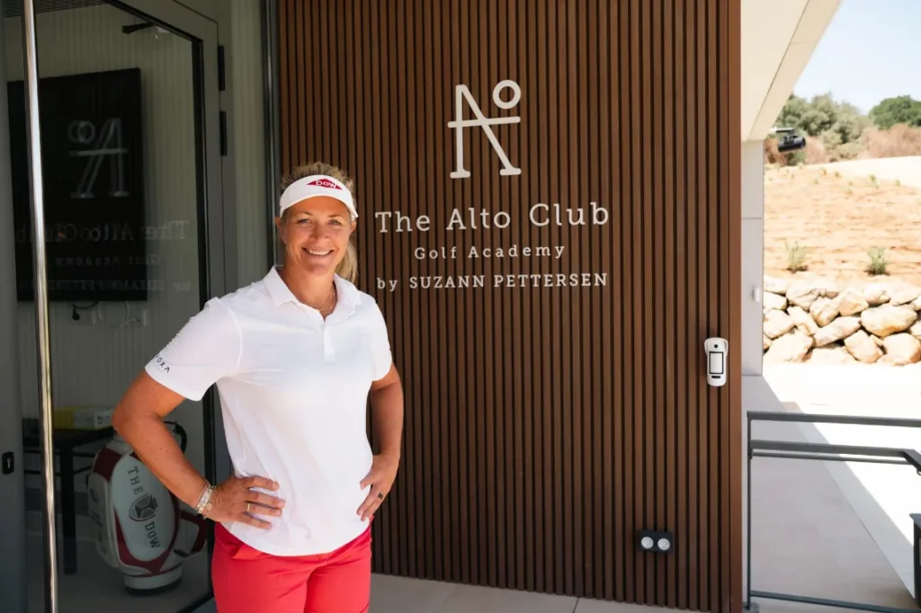 a woman standing in front of a door