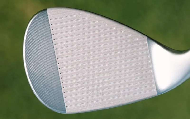 CBZ Wedge with Z-Alloy Offers Blade Feel in Cavity Design Golf club face with precision grooves
