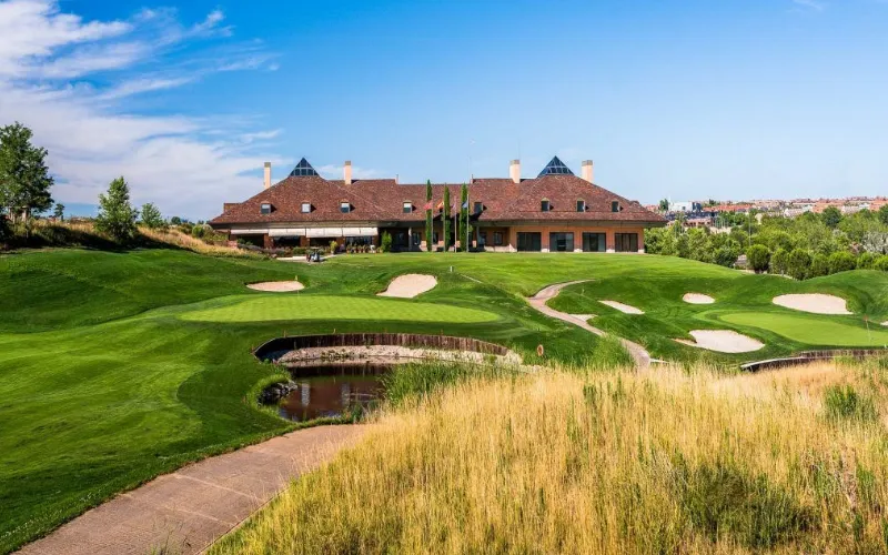 Discover Madrid’s World-Class Golf Venues a building with a golf course