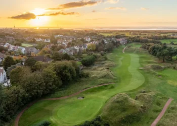 Hesketh’s Martyn Senior Lands Sixth Ace a golf course with a city and houses