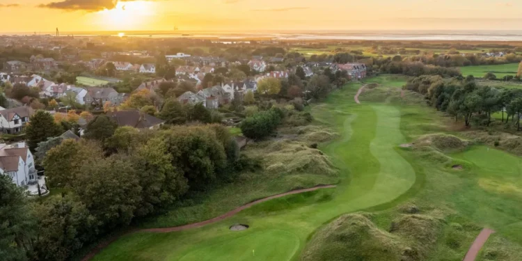 Hesketh’s Martyn Senior Lands Sixth Ace a golf course with a city and houses