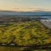 Ultimate Irish Jameson Golf Links Experience Launched a golf course with a beach and water in the background