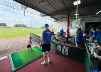 MNDriveathon5000 raises awareness and funds for MND a man and child playing golf