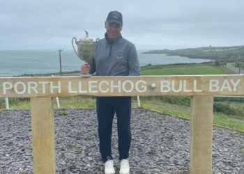 Sansome drives his way to Welsh title success a man holding a trophy