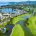 Rava Beach Club Laguna Phuket Opens Alongside Laguna Golf a golf course with water and buildings