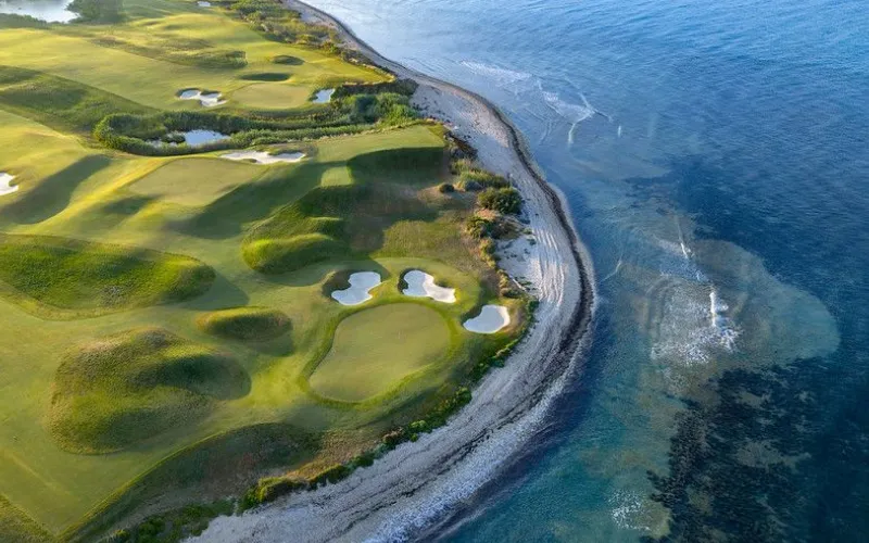Rocco Forte Emirates Golf Federation Partnership Announced Lush golf course meets serene coastline.