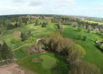 Dave Nelson Wins Fourth Cheshire Men's Senior Title Lush green golf course landscape aerial view.