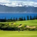 Lush golf course with ocean backdrop