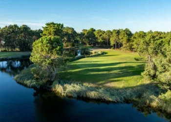PGA Aroeira No.2 Renovation Complete After Major Upgrade Lush golf course beside tranquil water