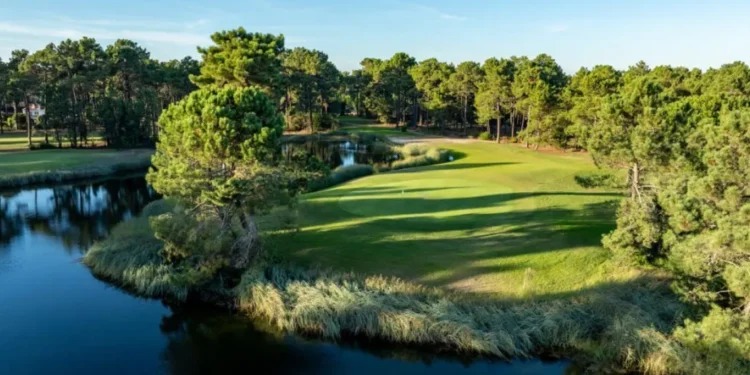 PGA Aroeira No.2 Renovation Complete After Major Upgrade Lush golf course beside tranquil water