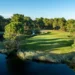 PGA Aroeira No.2 Renovation Complete After Major Upgrade Lush golf course beside tranquil water