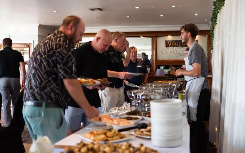 Mellor Golf Club Hosts Greater Manchester Business Golf Cup Players enjoying the food at the Greater Manchester Business Golf Cup