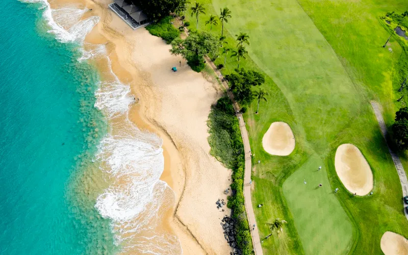 Kā'anapali Golf Courses Maui Open for Play Beach and golf course by ocean
