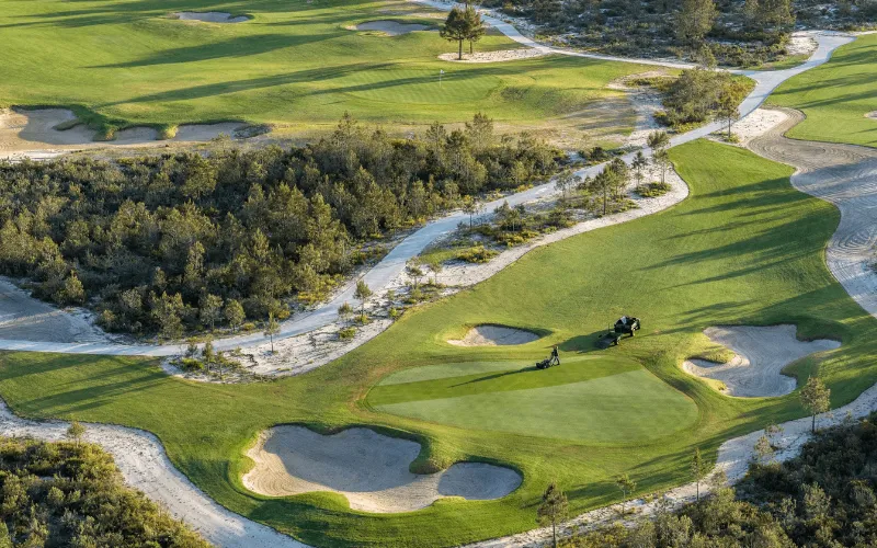 Sergio García Unveils The Torre Course at Terras da Comporta Lush golf course with sandy features.