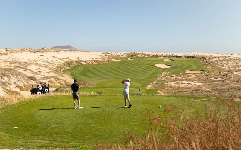 Solmar Golf Links par-72 hole with Pacific Ocean views and desert landscape.