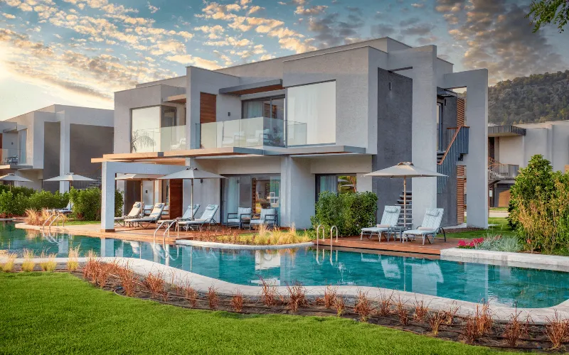 This stylish suite at Hilton Dalaman Lake House villas has direct access to the swimming pool from a swim-up terrace.